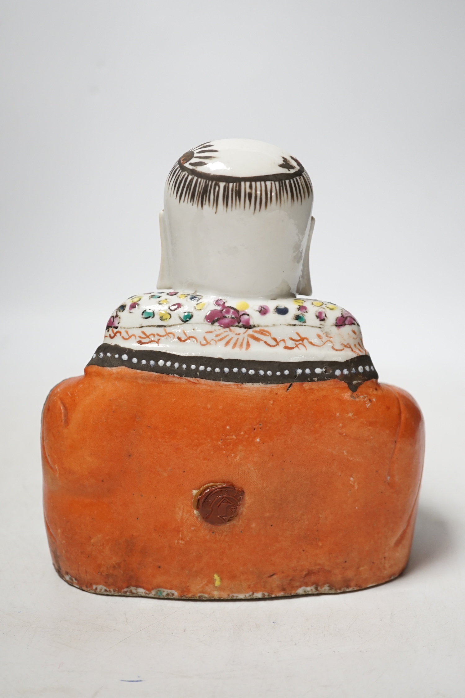 A Chinese enamelled porcelain figure of Budai, late 18th/early 19th century, 18cm high